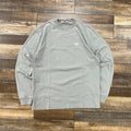 Kith Long-Sleeve LAX Tee Court in gray laid flat on wooden floor preowned
