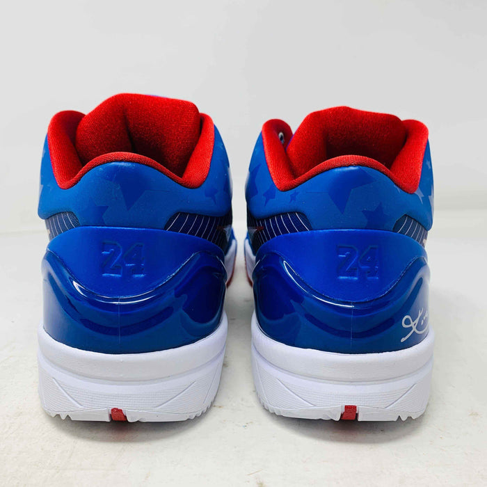 The Nike Kobe 4 Protro Philly (2024) sneakers feature blue uppers, red interiors, and white soles with star patterns. Number 24 and a signature on the heels complete their iconic look, all presented against a crisp white background.