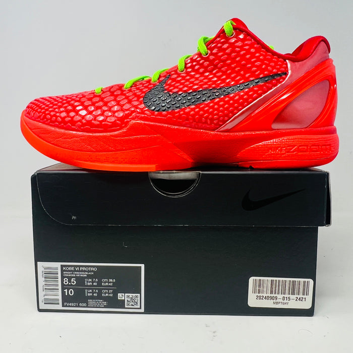 Nike Kobe 6 Protro Reverse Grinch sneakers, red with black swoosh, on box, 2023 model.