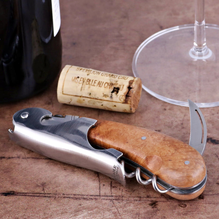Laguiole Magnum Briarwood Corkscrew, close-up of the polished stainless steel and light brown wood handle.