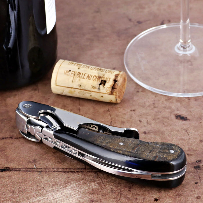Laguiole Magnum Buffalo Bark Corkscrew - C, close-up of dark wood and metal handle.