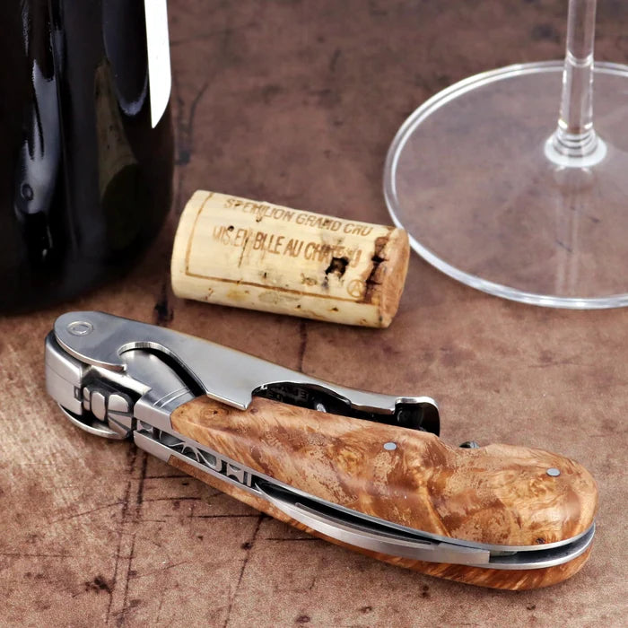 Laguiole Magnum Burled Teak Corkscrew, close-up side view showing polished steel and wood grain handle.