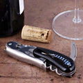 Laguiole Magnum Two-Step Corkscrew, close-up of black feather inlay handle and polished steel.