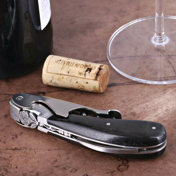 Laguiole Magnum Corkscrew Deco Rose - Ebony, close-up of rose detail on black handle.