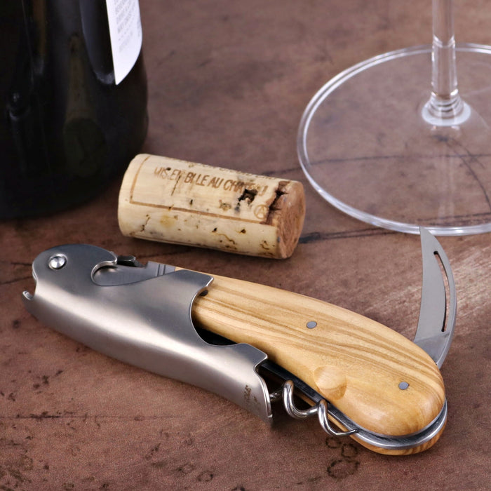 Laguiole Magnum Corkscrew Deco Woodcock - Olive Wood, close-up of the olive wood handle and stainless steel body.