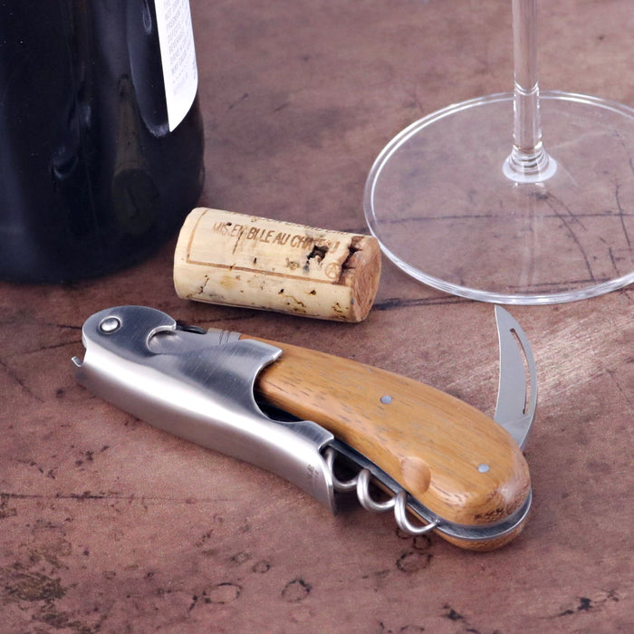 Laguiole Magnum Mahogany Corkscrew, close-up of wood handle and stainless steel mechanism.
