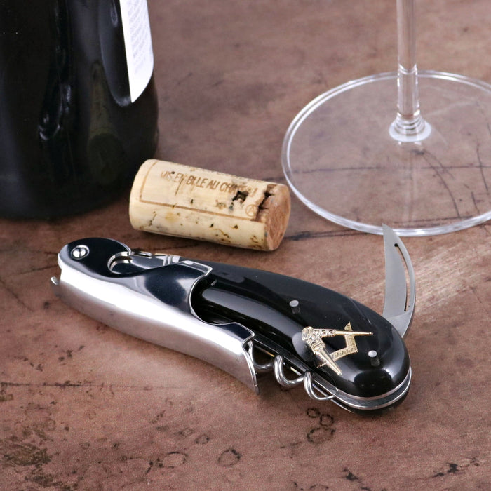 Laguiole Magnum Masonic Symbol Inlay Corkscrew, close-up of black handle with gold Masonic emblem.