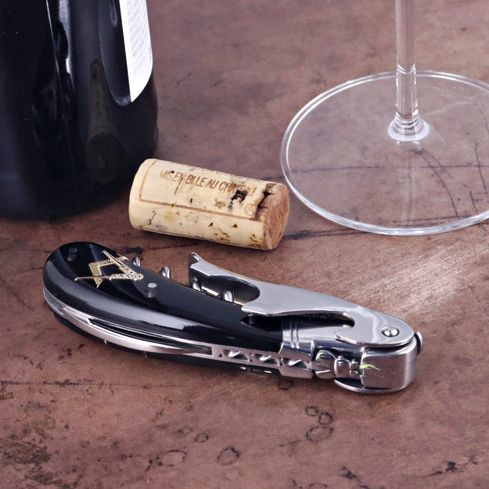 Laguiole Magnum Masonic Symbol Inlay Corkscrew, close-up of black handle with gold Masonic symbol.