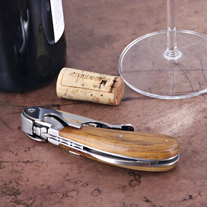 Laguiole Magnum Pistachio Corkscrew, close-up of its polished wood handle and stainless steel body.