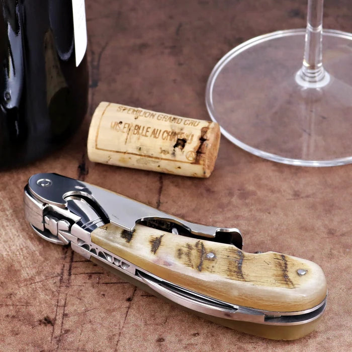 Laguiole Magnum Ram Horn Corkscrew close-up featuring a polished steel frame and natural horn handle.