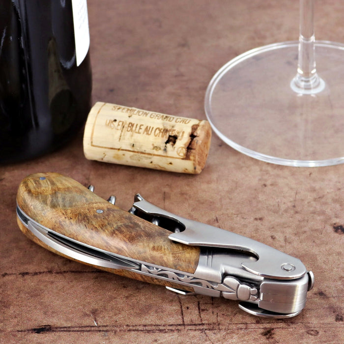 Laguiole Magnum Teak Corkscrew, close-up of teakwood handle and stainless steel mechanism.