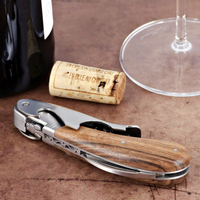 Laguiole Magnum Walnut Corkscrew, close-up of walnut handle and stainless steel mechanism.