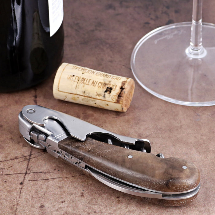 Laguiole Magnum Walnut Corkscrew, close-up of folded stainless steel tool with rich walnut handle.