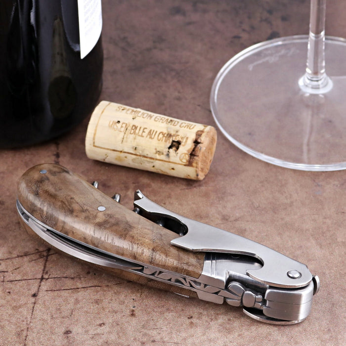 Laguiole Magnum Walnut Corkscrew, close-up side view showing polished steel and natural wood handle.
