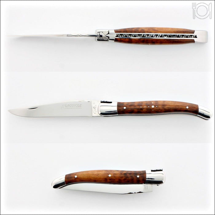 Laguiole Traditional 12 cm Knife Amourette, top-down view of the open knife, showing the intricate spring and wood handle. Handcrafted details, 100% Made in France.