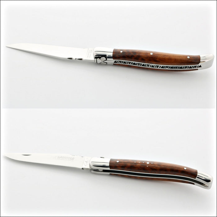 Laguiole Traditional 12 cm Knife Amourette, top-down view of the open knife, showing the polished steel blade and rich brown amourette wood handle with decorative metalwork. Handcrafted details, 100% Made in France.