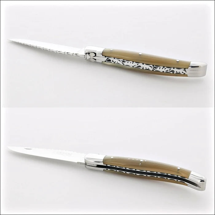 Laguiole Traditional Knife 12 cm Guilloche Light Horn Tip, top-down view of the serrated blade and light horn handle. Handcrafted details, 100% Made in France.
