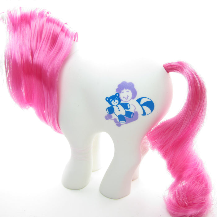 Lil Tot My Little Pony with teddy bear, rag doll, and ball symbol