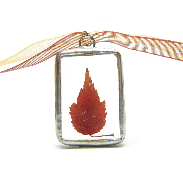 Soldered glass pendant necklace with red maple leaf