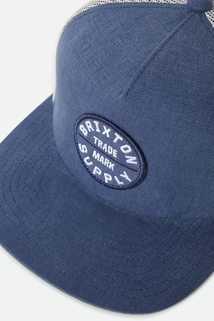 Unisex Oath Trucker Hat in the color Blue Chambray/White - Additional Laydown image