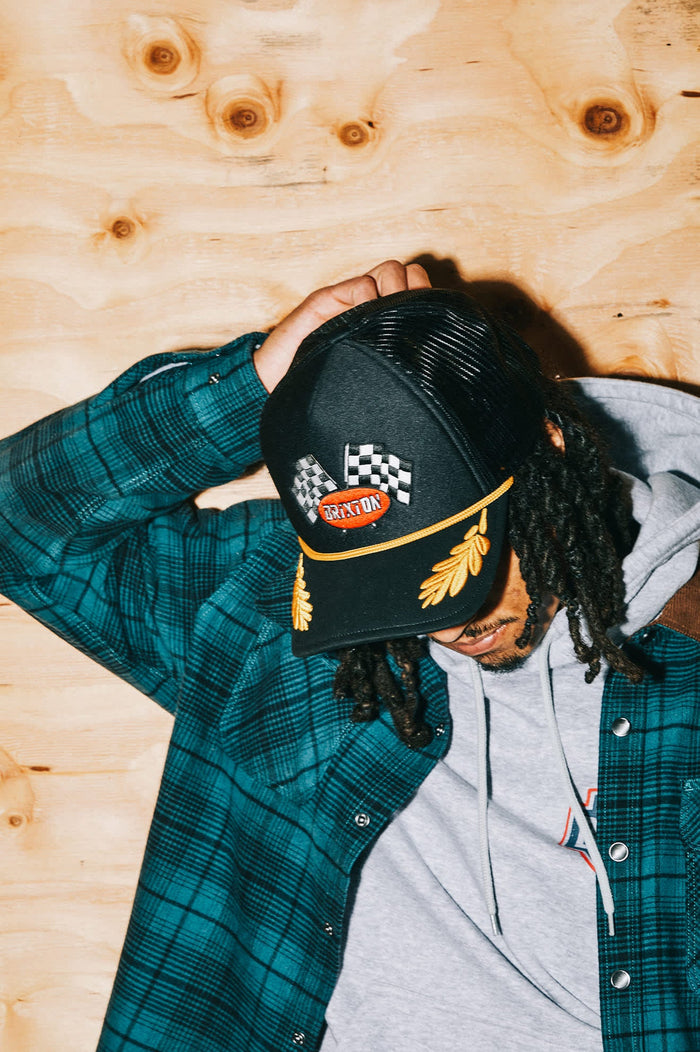 Women's Podium Netplus Trucker Hat in the color Black/Black - Men's Lifestyle image