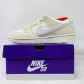 Nike SB Dunk Low City Of Love Light Bone sneakers with red laces, brand new condition, displayed on a purple Nike SB box.