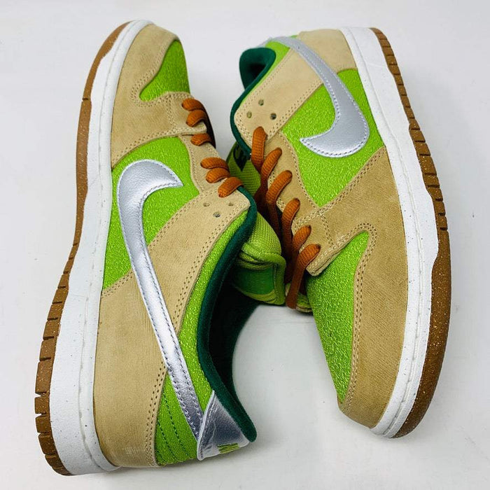Brand new Nike SB Dunk Low Escargot sneakers, 2024 release, green and brown colorway with silver Swoosh.