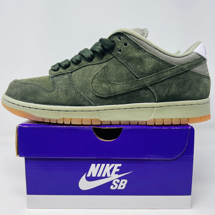 Nike SB Dunk Low Pro B Sequoia skate shoe on purple Nike SB box, green suede upper, gum sole, 2025 model