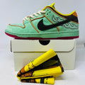 Nike SB Dunk Low Rodeo 2025 skate shoe with mint green suede, black swoosh, yellow accents, and included bandana accessory
