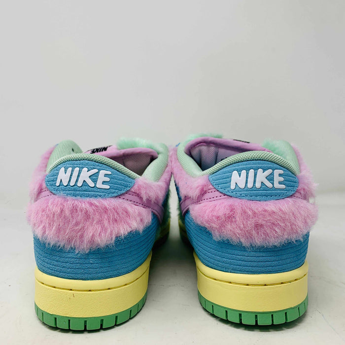 The Nike SB Dunk Low Verdy Visty sneakers are vibrant new additions for 2024, featuring blue, pink, and green accents, a fluffy collar texture, a bright yellow sole, and the iconic white Nike logo on the back.