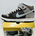 Nike SB Dunk Mid Cappuccino Silver sneaker side view on yellow box with extra gray laces, suede and leather upper, 2009 model