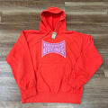 Stussy Champion Hoodie in tomato red with front logo and kangaroo pocket, brand new condition