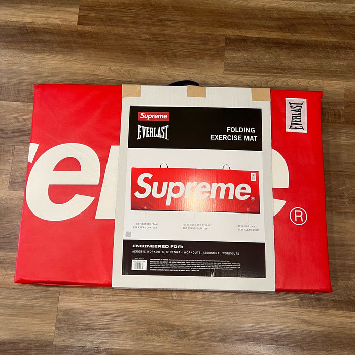 Supreme Everlast Folding Exercise Mat red packaging on wooden floor