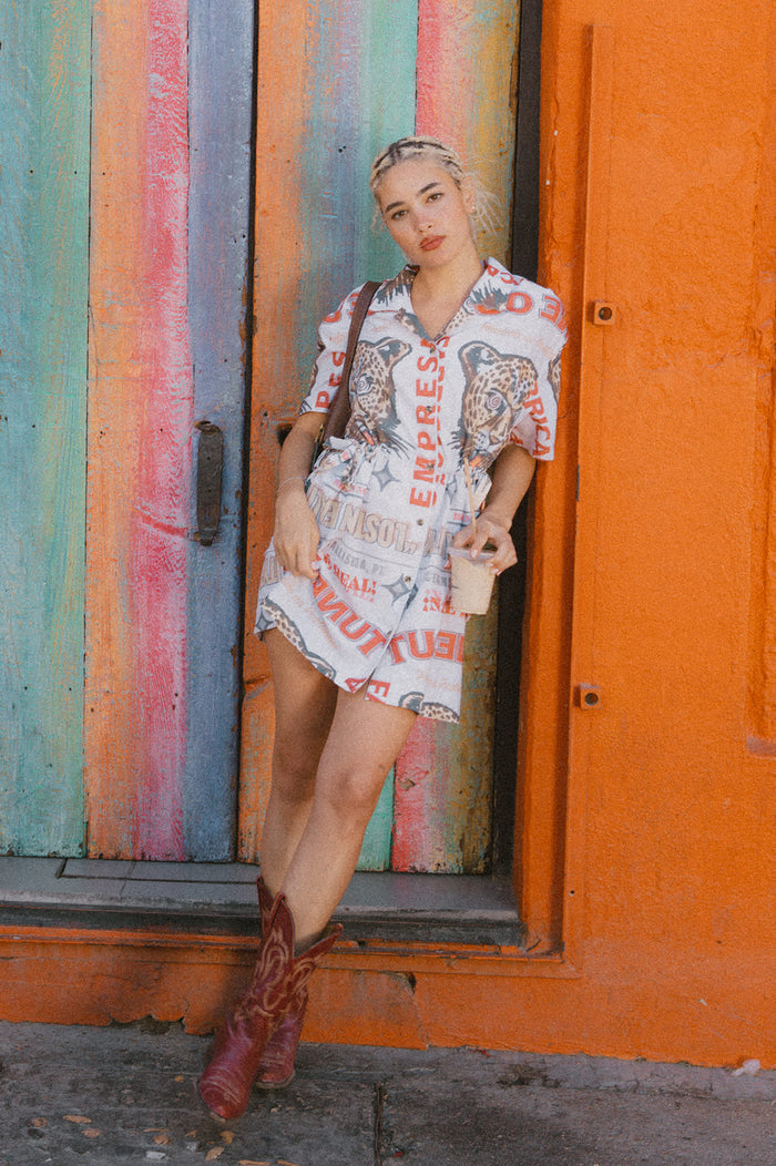 Women's The Cinch Button Down Short Sleeve Dress in the color Lost In Reality Print - Men's Lifestyle image