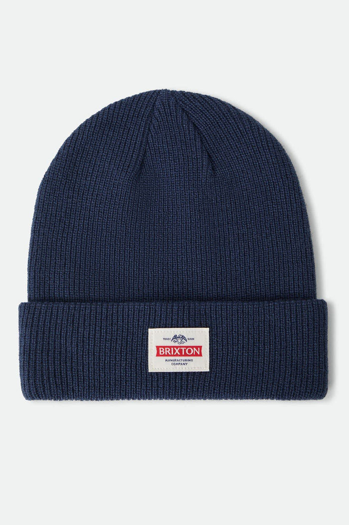 Unisex Trademark Beanie in the color Navy - Front Product Laydown Image