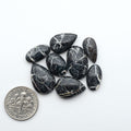 Natural White Buffalo Stone Cabochons are semi-precious gemstones cut into shapes ideal for jewelry-making, making them an excellent choice for artisans.