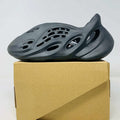 Yeezy Foam RNNR Onyx 2022 brand new black slip-on sneaker with lightweight foam cushioning and futuristic design