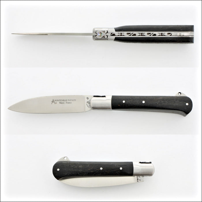 Yssingeaux 11 cm Classic Pocket Knife - Ebony Handle. Top-down view, open blade, dark ebony handle with metal accents. Handcrafted details, 100% Made in France.